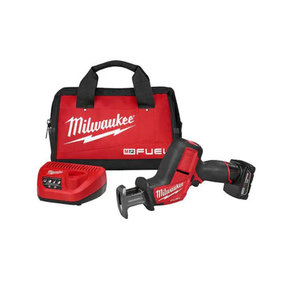 Milwaukee power tool set with battery and bag on a white background