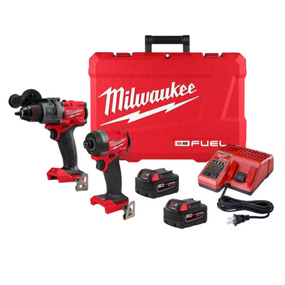 Milwaukee M18 FUEL 2-Tool Combo Kit 3697-22 including the 2904-20 hammer drill, 2953-20 impact driver, two XC 5.0Ah batteries, charger, and blow molded carrying case.